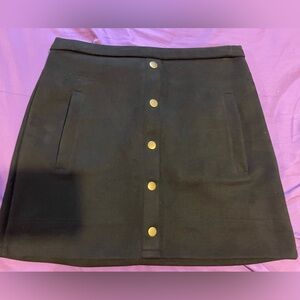 Small black zip up mini skirt